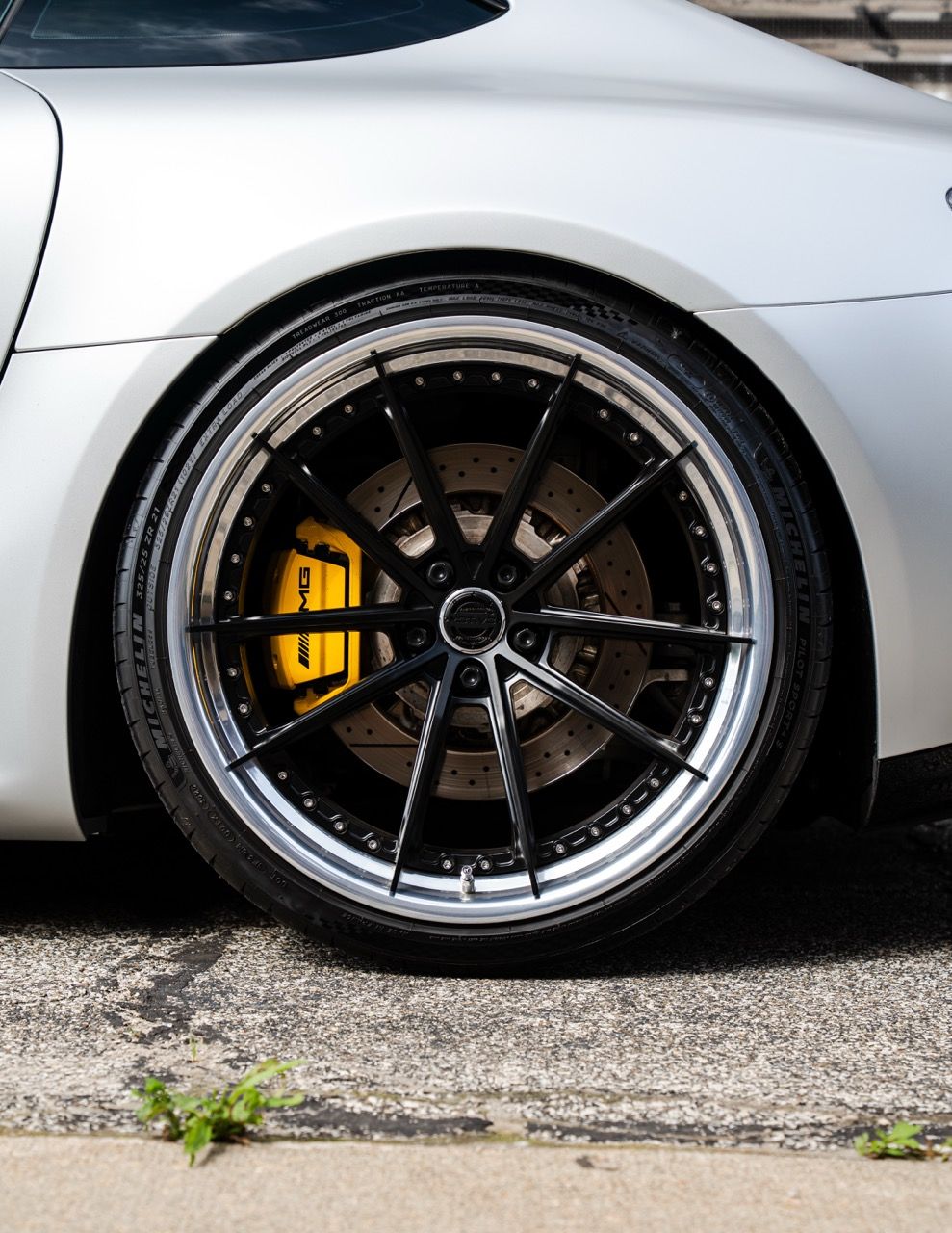 Mercedes-Benz AMG GTR with Motivo Forged CS-N custom wheels in frozen black face and gloss polished clear lip rear wheel view
