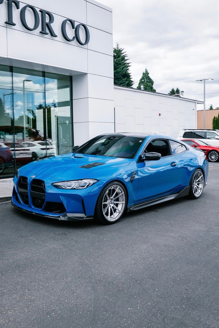 BMW M4 with Motivo Forged CS-U custom wheels in gloss polished clear face and brushed clear barrel side view