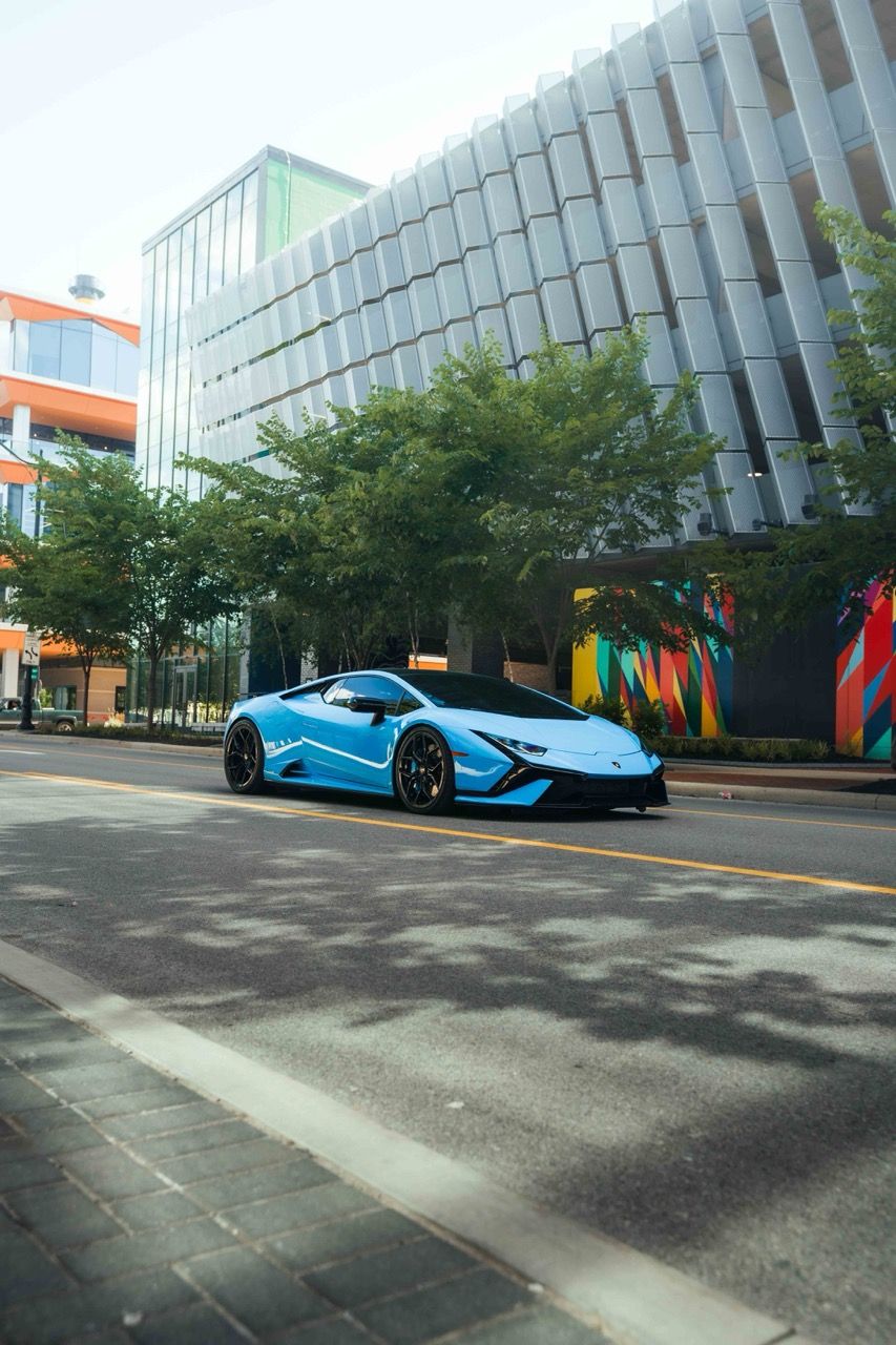 Lamborghini Huracan Tecnica with Motivo Forged MB-L custom wheels in gloss black front side view