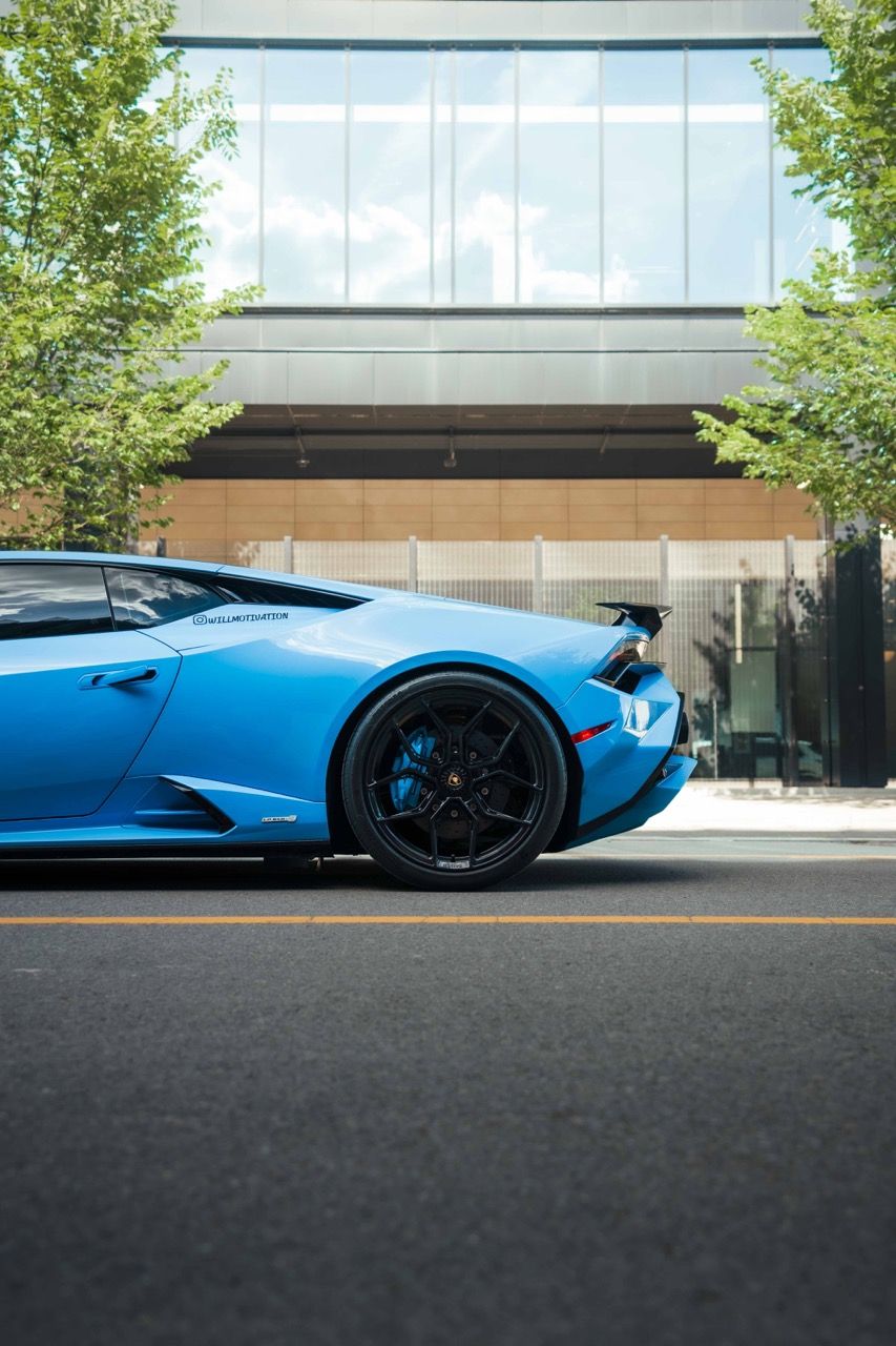 Lamborghini Huracan Tecnica with Motivo Forged MB-L custom wheels in gloss black rear half side view