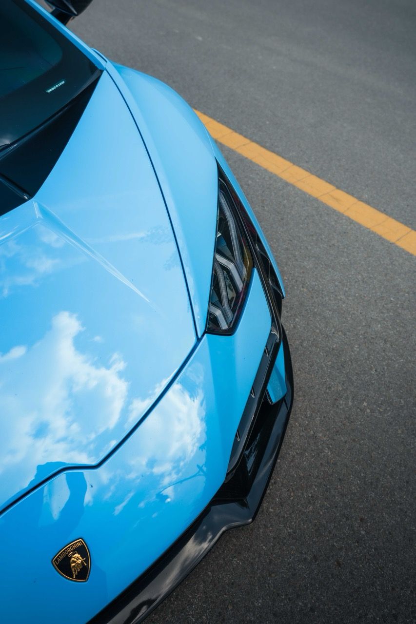 Lamborghini Huracan Tecnica with Motivo Forged MB-L custom wheels in gloss black car front half view